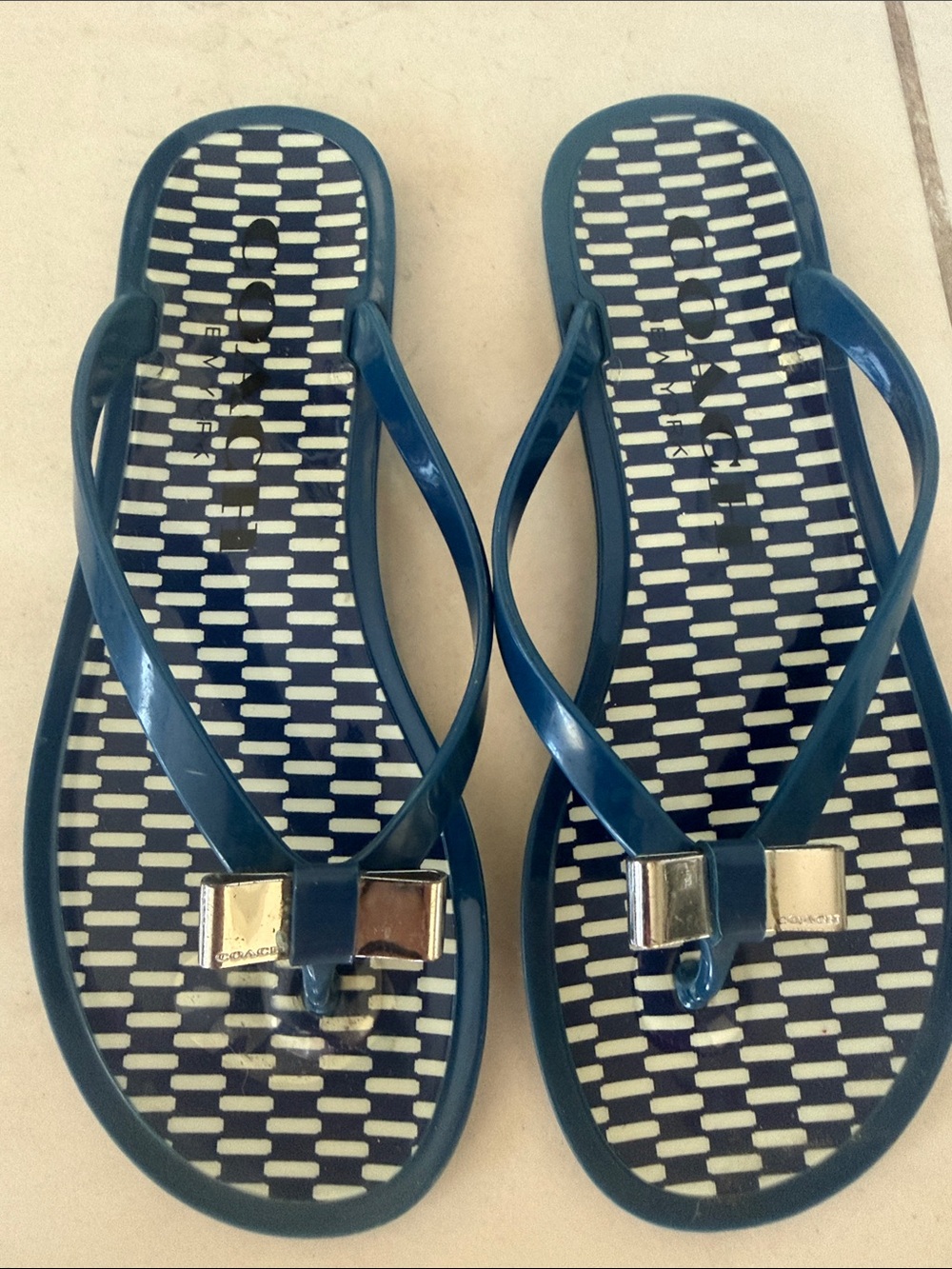 Coach Navy Blue Jelly Thong Sandals with Silver Bow Accent